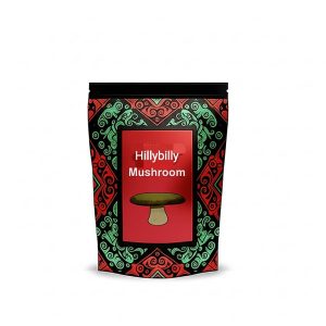 Buy Hillbilly Mushrooms – Smooth, Balanced Psilocybin Strain – Trippy Soul MarketPlace Dried Hillbilly Mushrooms with golden caramel caps and blue-bruised stems on a white surface.